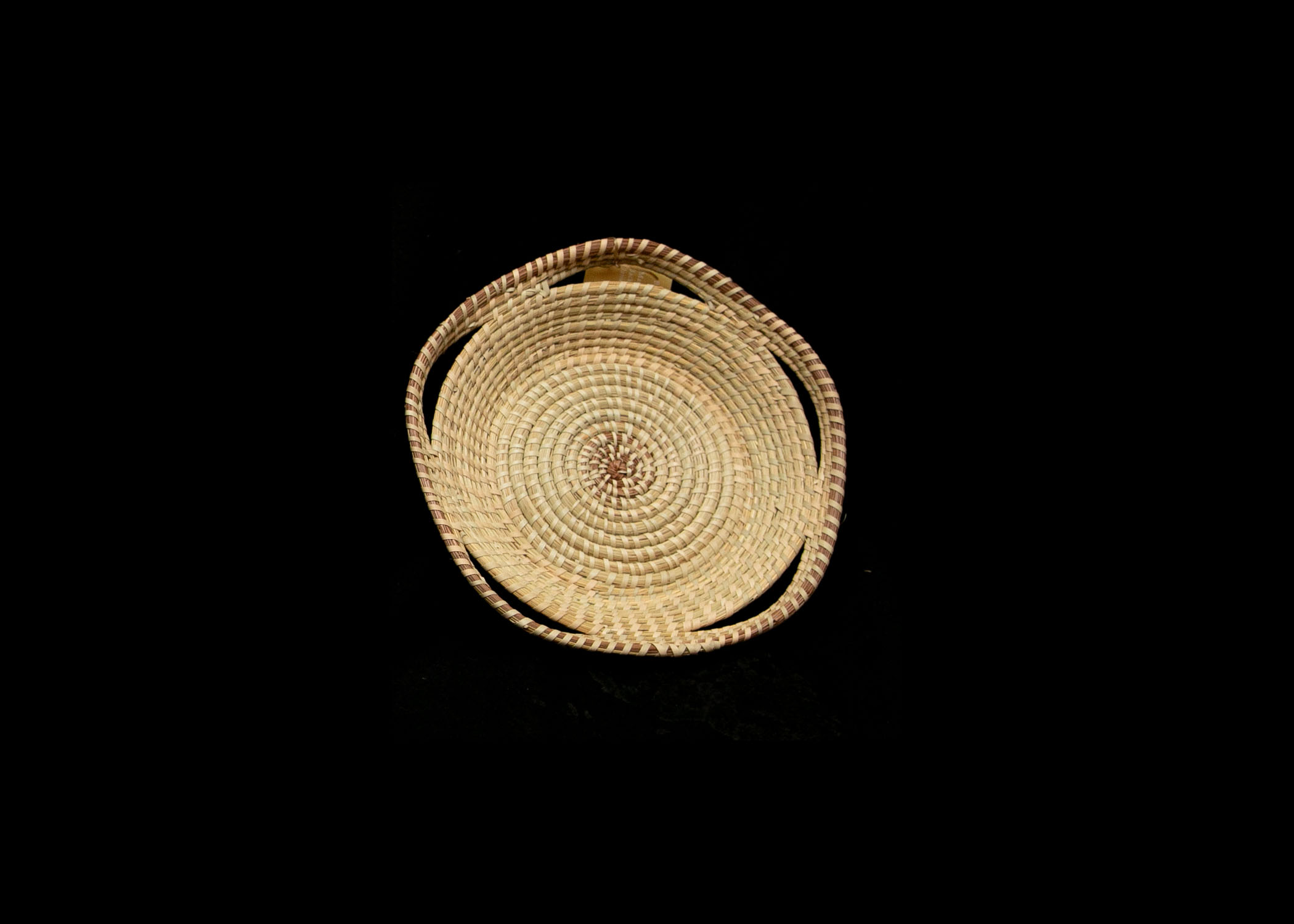 Round sweetgrass tray with side handles