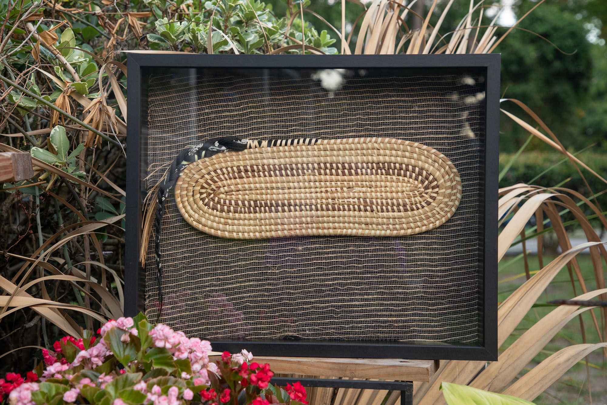 The Story of Rice, Part 1: Food for the Journey — framed oblong sweetgrass basket with a braid of hair