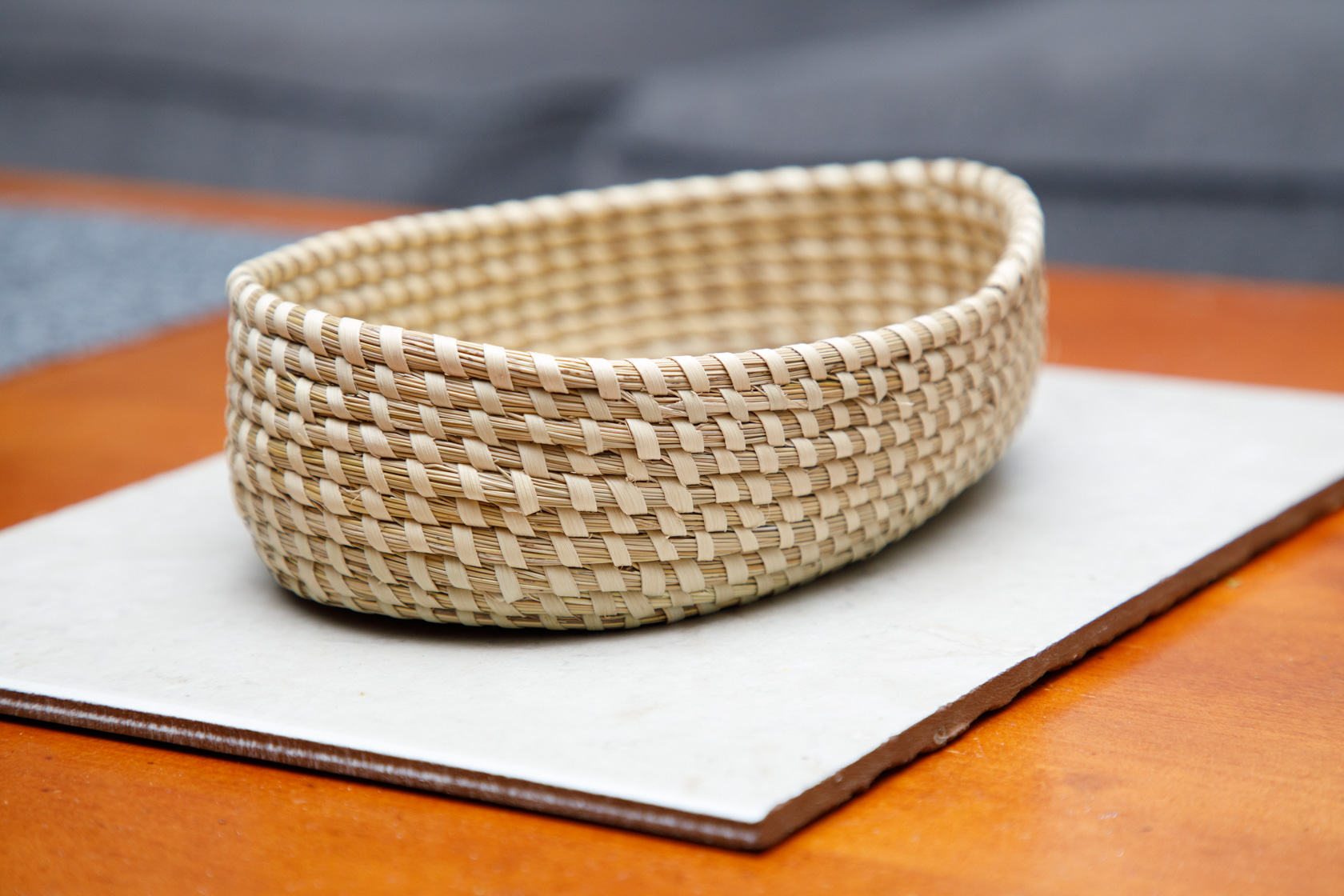 Oval coiled sweetgrass basket